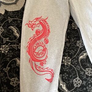 Gray Sweatpants with Red Dragon Design
